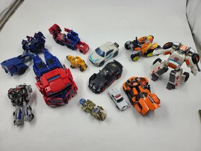Lot of Vintage & Modern Transformers Action Figures - Image 1 of 4