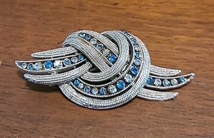 Vintage Silver Tone Blue Rhinestone Knot Brushed Open Work Pin Brooch MCM 3" - Picture 1 of 8