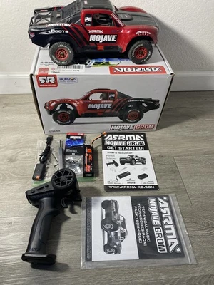 Arrma Mojave Grom MEGA 4WD 380 Brushed 1/18 Electric Desert Truck RTR Red Black  - Image 1 of 4