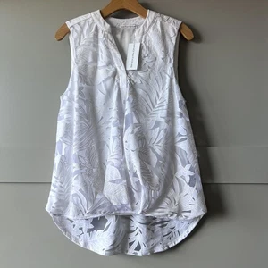 Notazioni blusa senza maniche donna media bianca floreale burnout collo alto basso a V - Foto 1 di 9