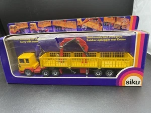 Camión SIKU #3415 HOMBRE con grúa semirremolque escala 1:55 con caja dañada - Imagen 1 de 15