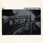 U2 - A Day Without Me (7", Single, Pun)