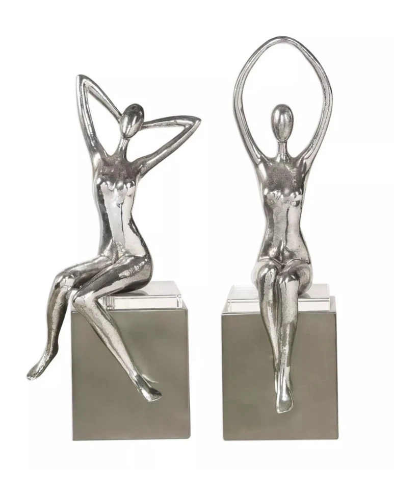 Juego de 2 estatuillas Uttermost Jaylene de resina de acero y cristal en plata Foto 1 de 4