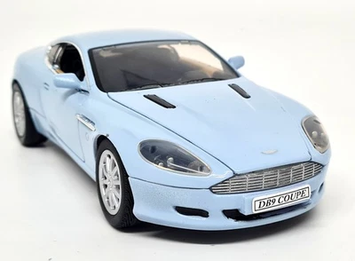 Motormax 1/24 Aston Martin DB9 cupé azul claro diecast modelo de coche a escala Foto 1 de 4