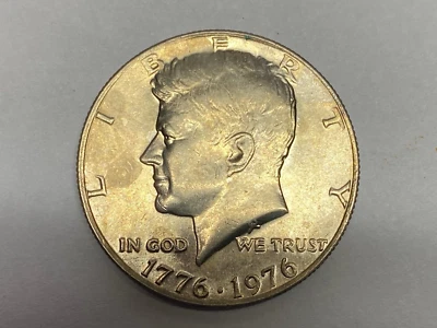 Medio dólar Kennedy 1776-1976 sin marca de ceca, reverso invertido Foto 1 de 2