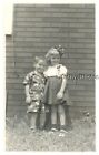 Found B&W Photo G_7828 Cute Little Boy And Girl Standing In Front Of Brick Wall