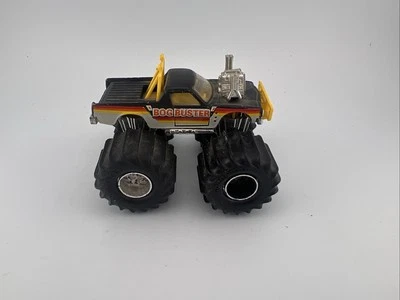 VNM Matchbox Super Chargers 1986 Bog Buster, Black 4x4 Chevy Pickup w Yellow - Image 1 of 4