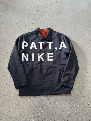 Jaqueta corta-vento Patta x Nike preta forrada com pele - Imagem 1 de 4