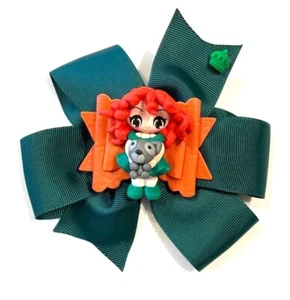 Beautiful Clay Merida with her dog inspired hair bow for girls. - Picture 1 of 3