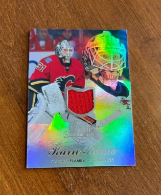 Karri Ramo 2014-15 Fleer Flair Showcase Game Used Jersey Row 2 Seat 18 Flames - Image 1 of 2