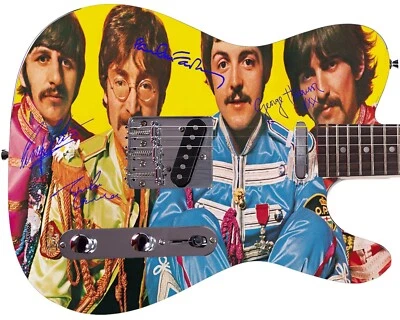 The Beatles Autographed Sergeant Peppers Album LP Dvd Poster Photo Guitar  - Image 1 of 3