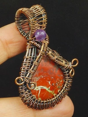 Colgante de piedras preciosas de piedras de sangre de joyería hecha a mano envuelto en alambre de cobre Foto 1 de 4