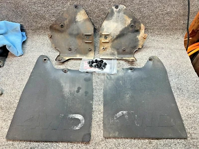 Toyota 4Runner Rear Mud Flaps and Brackets w Screws First Gen OEM 1984-1989 - Image 1 of 4