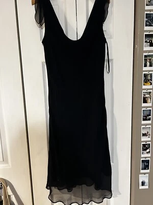 Vestido vaina ABS By Allen Schwartz para mujer negro sin mangas con volantes hasta la rodilla 8 Foto 1 de 4