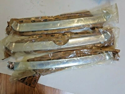 Nuevo OEM NOS 1984 1985 Ford Tempo parrilla delantera molduras barras de acero inoxidable Foto 1 de 4