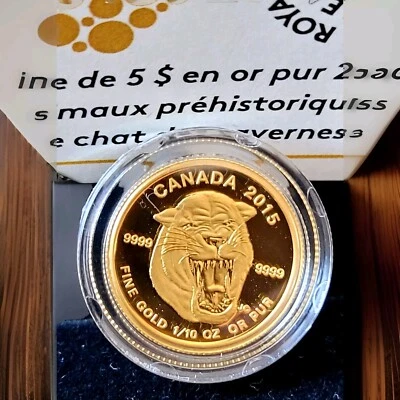 2015$5 PREHISTORIC ANIMALS Scimitar Sabre-Tooth Cat 1/10 Oz.9999 Pure Gold Coin - Image 1 of 4