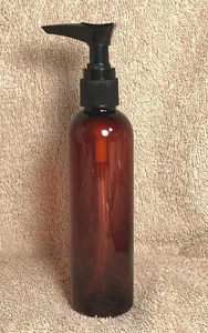 Botellas redondas bala PET ámbar de 4 oz 20/410 bomba de sillín acanalado negro cantidad 6 OFERTA - Imagen 1 de 2