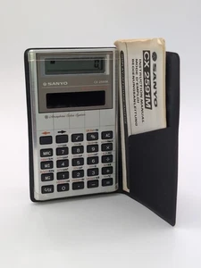 Calculadora de Bolsillo Sanyo Solar CX 2591M De Colección Con Manual Original *Rara* - Imagen 1 de 5