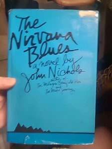 The Nirvana Blues By John Treadwell Nichols 1st Edition- HCDJ - Picture 1 of 4