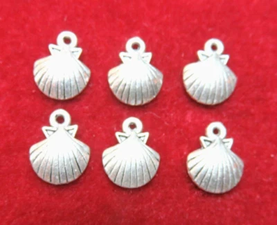 6 Pcs ~ SHELLS ~ CHARMS ~ PENDANTS ~ SILVER METAL ~ JEWELRY LOT - Image 1 of 2