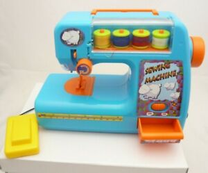 Machine à coudre enfant jeu imitation à piles bleu avec 4 bobines de fils 