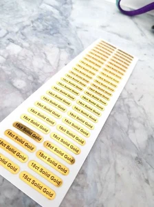 18ct Solid Gold Stickers Labels Shiny Yellow Vinyl 25mm x 5mm Sheet of 50 NEW - Picture 1 of 2