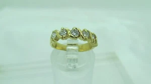 14k YELLOW GOLD & .05CTW DIAMONDS ANNIVERSARY WAVE DESIGN BAND RING size 4 - Picture 1 of 12