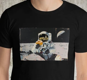 Lunar Donut T-Shirt Astronaut Eating Doughnut in Space Vintage Sci-fi Lunar Gift - Picture 1 of 6