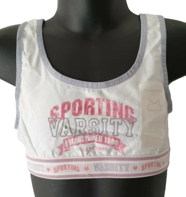 Nuevo con etiquetas Prenda para el torso estilo sujetador corto suave elástico blanco marca Absorba talla 14A para niñas Foto 1 de 2