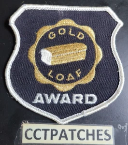 VINTAGE EVANGELINE MAID BREAD GOLD LOAF AWARD PATCH - Bild 1 von 2