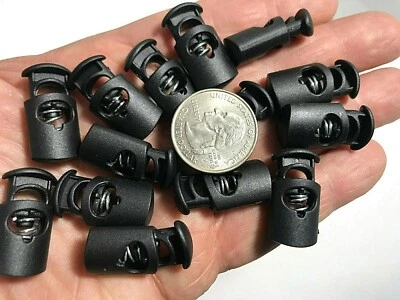 Palanca de tapón de bloqueo de cable de plástico negro con cordón de resorte Paracord 1 agujero CL9 Foto 1 de 4