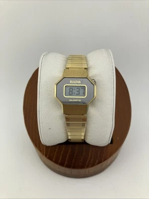 Vtg 1977 Bulova Ladies 24mm Digital Watch Gold Tone Gray Dial Stretch Band -RUNS - Image 1 of 4