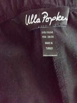 Calça de malha preta Ulla Popken, plus size 28/30W - Imagem 1 de 4