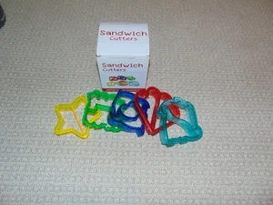 SET OF FIVE NEW SANDWICH CUTTERS--HEART/DOLPHIN/TRAIN/STAR/DINOSAUR - FREE SHIP - Picture 1 of 4