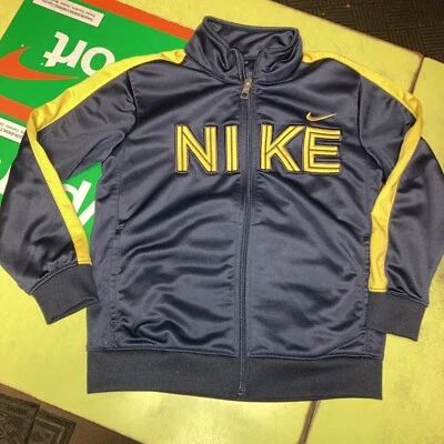Chaqueta de chándal Nike para niños talla 6 - nunca usada - azul marino/amarillo manga larga cremallera Foto 1 de 4