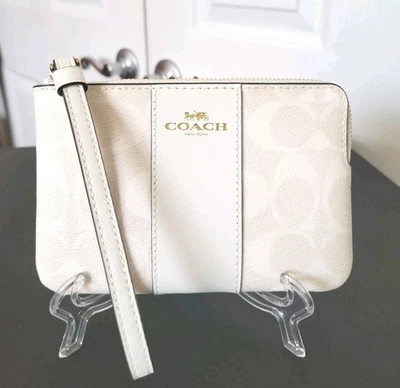 NUEVO CON ETIQUETAS COACH Signature PVC Esquina Cremallera Muñequera Lona Raya Glaciar Blanco Foto 1 de 4