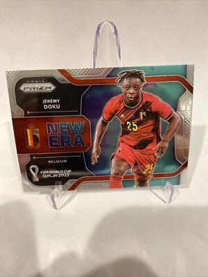 2022 PANINI PRIZM WORLD CUP JEREMY DOKU NEW ERA #36 BELGIUM - Image 1 of 2