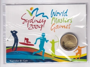 AUSTRALIANO: MONEDA DE $1 DE LOS JUEGOS MAESTROS DEL MUNDO DE Sydney 2009 en tarjeta # mediados de 2985 - Imagen 1 de 2