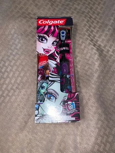 Colgate MONSTER HIGH Skull Battery Op, spazzolino da denti e dentifricio nuovo con scatola - Foto 1 di 4