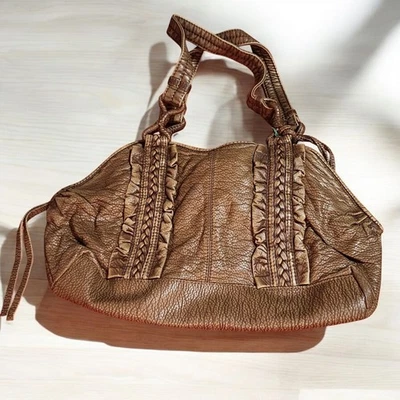 MARC ECKO RED PEBBLED FAUX LEATHER BOHO HANDBAG - Image 1 of 4