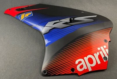 NUEVO CARENADO LATERAL IZQUIERDO APRILIA RS 50 SBK NEGRO 2003 AP8258777 GENUINO - Imagen 1 de 3