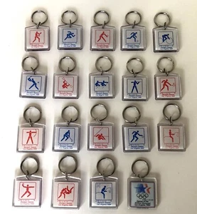 XXIIIrd Olympiad Key Chain 1984 L.A. Los Angeles 18 Olympic Sports NWOT - Picture 1 of 21