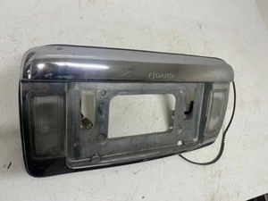 NISSAN FIGARO REAR NUMBER PLATE SURROUND WITH REVERSE LIGHT - Picture 1 of 8