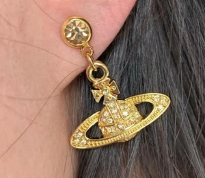 Vivienne Westwood Bas Relief Saturn Drop earrings Gold Tone New With Box - Picture 1 of 5