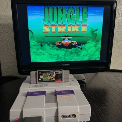 Jungle Strike (SNES) Super Nintendo Authentic OEM Cartridge Tested & Cleaned  - Image 1 of 4