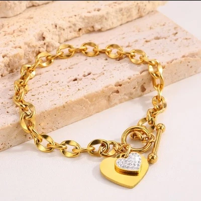 Pulsera corazón acero titanio banda eslabones tono dorado joyería oficina mujeres 1 pieza Foto 1 de 4