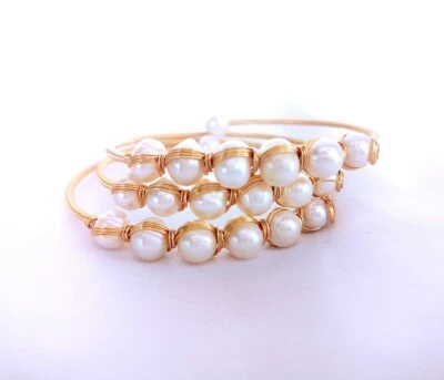 Pulsera de perlas de agua dulce blanca ovalada de seda enrollada hecha a mano de 3 hilos 18 piezas 7-8 mm Foto 1 de 4