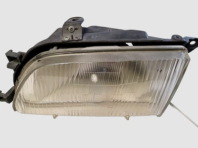 Faro lateral izquierdo izquierdo del conductor Toyota Tercel 1996 y 1997 OEM Koito 110-76087 L Foto 1 de 3