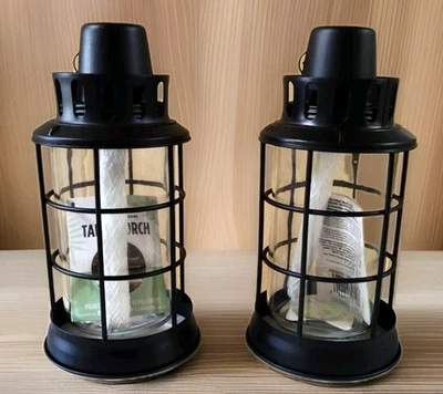 TIKI Table Top Lanterns Black 2 Pk  Outdoor Glass Oil Lamp up to 5 Hr Burn Time - Image 1 of 4