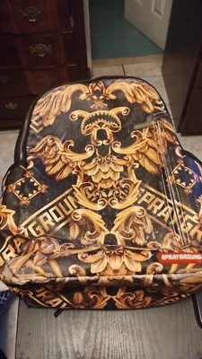 Mochila SprayGround 2019 edición limitada cuero dorado y piel Foto 1 de 4